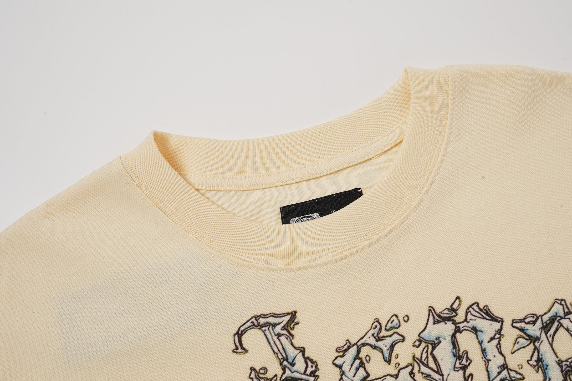 Godspeed Blue Skull Graphic Cream T‑Shirt