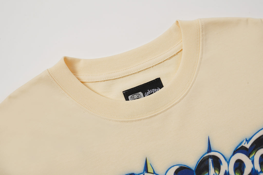 Godspeed Out Of Many One Cream Graphic T‑Shirt