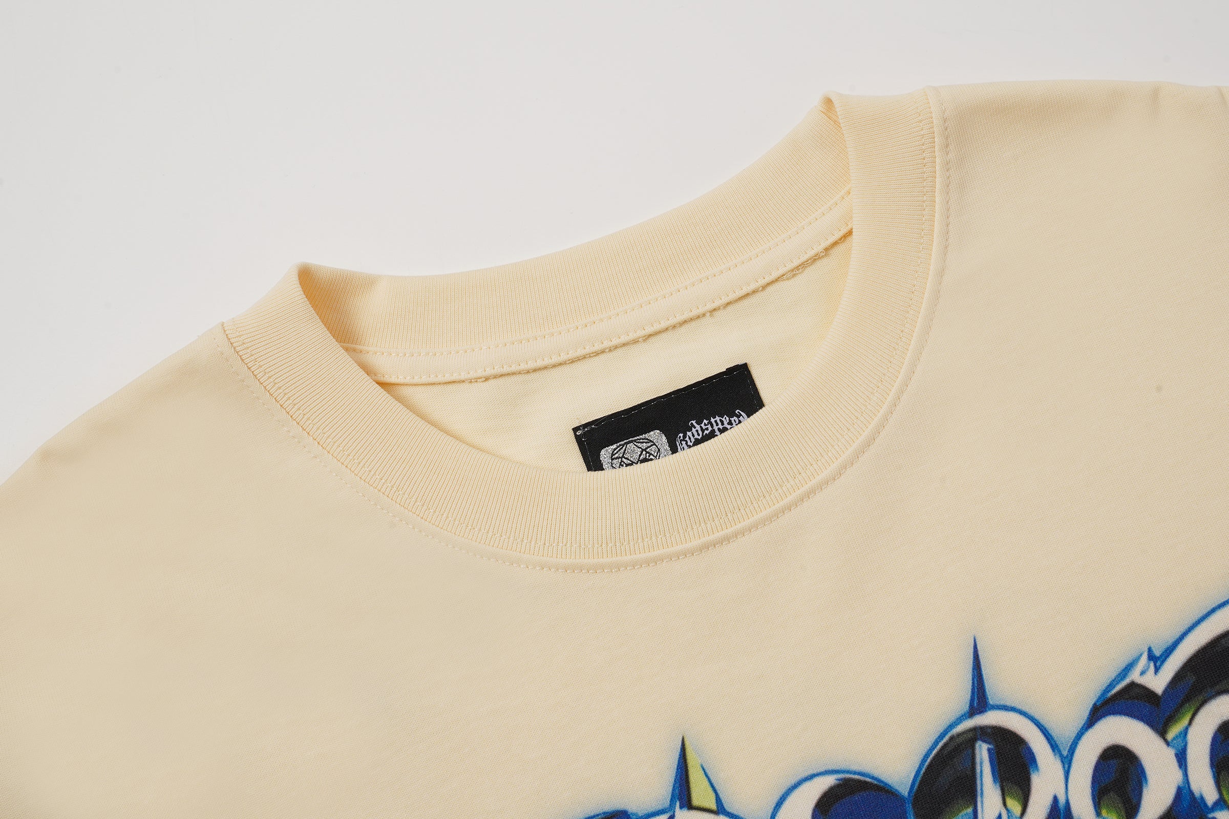 Godspeed Out Of Many One Cream Graphic T‑Shirt